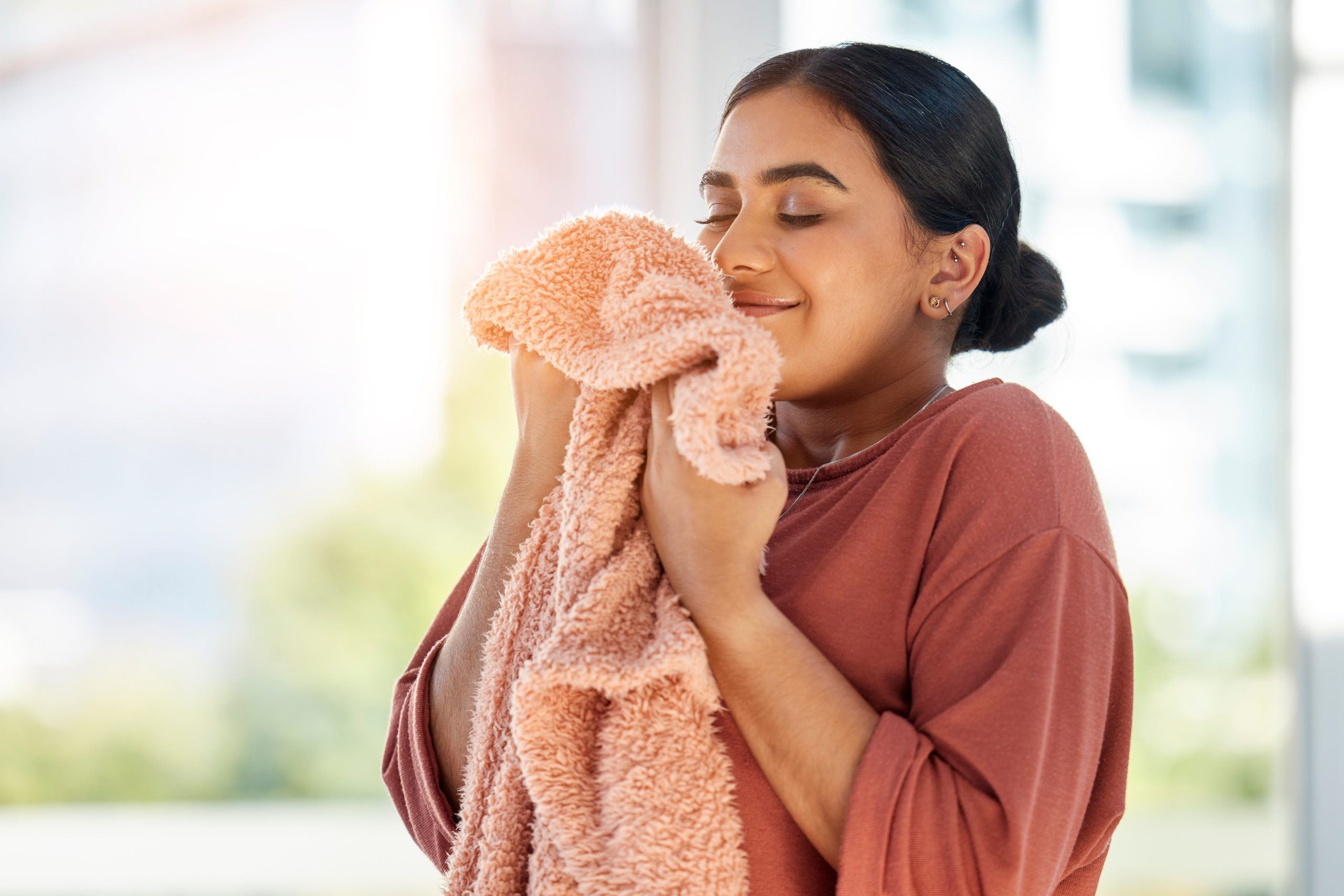Woman,Smelling,Clean,Laundry,,Blanket,Or,Fabric,For,Fresh,And